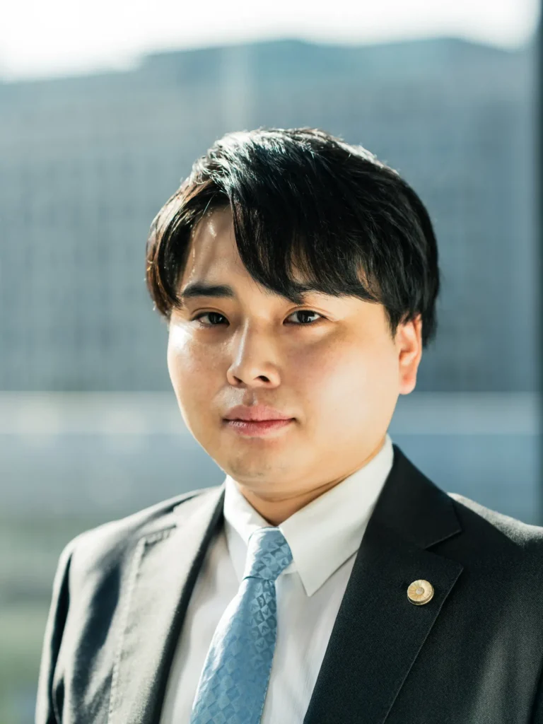 三角 一誠